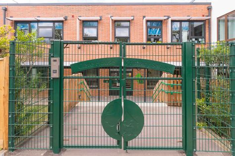 Bespoke gates to front entrance of new 420 place primary school. Modular construction with linear brick, zinc cladding and bespoke timber solar shading designed by Bailey Partnership School Gate Design Entrance, School Front Entrance, Contemporary Gates, Zinc Cladding, Building Furniture, Solar Shades, Front Entrances, Gate Design, Primary School