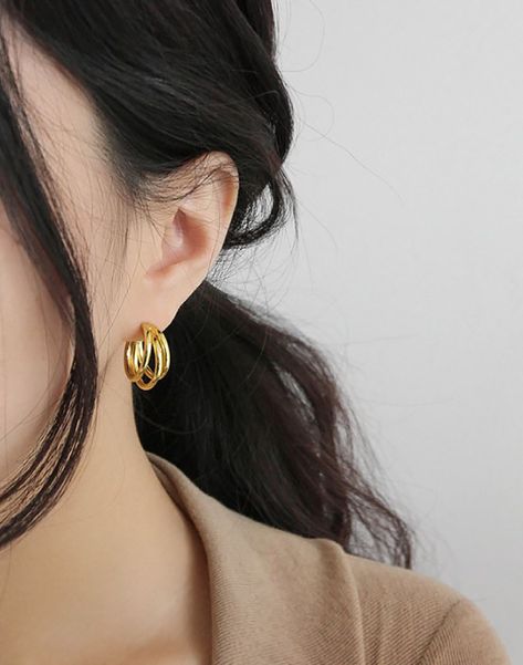 Explore our simple and timeless hoop #earrings made for your daily wear. Our Triple hoops earrings, as its name suggests, features three hollow C-shaped hoops. Minimal and edgy design to upgrade your daily outfit. Hypoallergenic and lightweight, they are handcrafted in gold vermeil and sterling silver. Shop now at www.inxsky.com #inxsky #jewelry #daintyjewelry #simplejewelry #earings #goldearrings #silverearrings #cuteearrings #daintyearrings #hoopearrings #goldhoopearrings #smallhoopearrings Western Gold Earrings, Gold Minimal Earrings, Small Gold Hoops Earrings, Small Earrings Gold, Triple Hoop Earrings, Small Gold Hoop Earrings, Gold Earrings Models, Minimal Gold, Simple Hoop Earrings