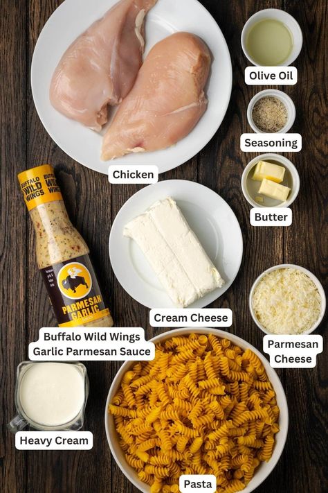 Creamy Buffalo Wild Wings Garlic Parmesan Chicken Pasta is a quick and easy dinner idea packed with bold flavor. Made with only 6 ingredients! One Pan Garlic Parmesan Pasta, 6 Ingredients Or Less Dinner Easy Recipes, Parmesan Chicken Buffalo Wild Wings, Buffalo Wild Wing Garlic Parmesan Crock Pot, Dump And Bake Garlic Parmesan Pasta, Tik Tok Chicken Pasta, Garlic Parmesan Chicken Pasta Buffalo Wild Wings, Bww Chicken Parmesan Recipe, Chick3n Recipes