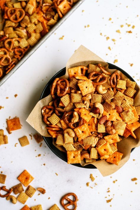 One of our favorite snacks to make for the holidays is our Slow Cooker Savory Chex Mix recipe. It is a great cereal mixture that you make with corn or rice Chex, some mini pretzels, cheese crackers, and of course unsalted butter! Chex Mix Recipes Crock Pot, Savory Chex Mix Recipes, Savory Chex, Savory Chex Mix, Rice Krispie Balls, Cinnamon Chex, Homemade Caramel Popcorn, Chex Mix Recipe, Popcorn Recipes Caramel