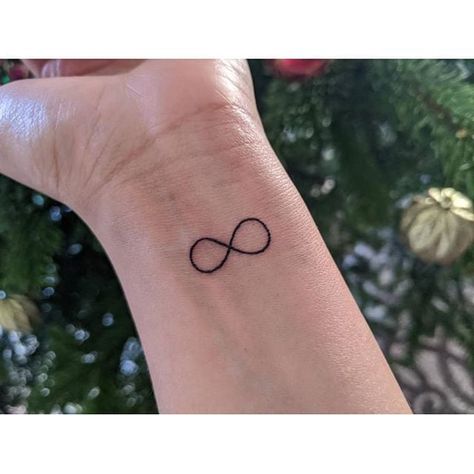 Infinity Sign Infinity Sign Tattoo, Small Wrist Tattoo, Infinity Tattoo On Wrist, Grey Ink Tattoos, Infinity Symbol Tattoo, Tiny Wrist Tattoos, Tattoo Spots, Bracelet Tattoo, Cool Wrist Tattoos