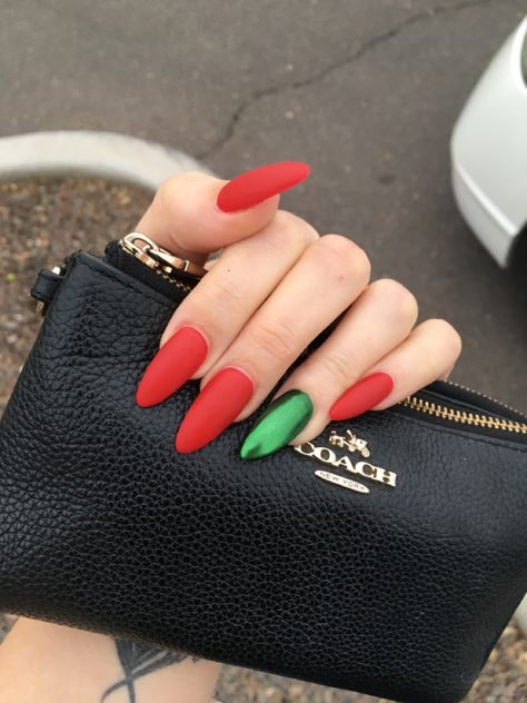 Green And Red Acrylic Nails, Matte Red Nails Christmas, Red Matte Nails Design Christmas, Holiday Nails Red And Green, One Hand Red One Hand Green Nails, Christmas Nails 2023 Red And Green, Green And Red Chrome Nails, Red And Green Christmas Nails Acrylic, Green Red And White Nails