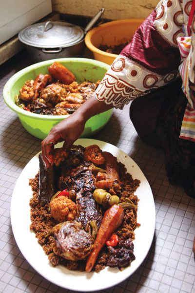 Thiéboudienne (Senegalese Fish and Rice), the national dish of Senegal.  For more, check out the May 2012 issue of Saveur! Senegalese Recipe, Fish And Rice, Fish Rice, West African Food, Africa Food, African Cooking, Nigerian Food, National Dish, Just Cooking