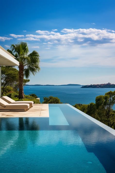 An infinity pool overlooking the sea Infinity Pool Tropical, Infinity Swimming Pool Designs, Residential Infinity Pool, Infinity Pool Mediterranean, Small Infinity Pool, Infinity Pool Design, Beach House Deck, Infinity Swimming Pool, Jade Design