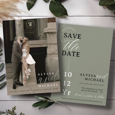 This elegant and simple black, sage green, and white modern typography wedding save the date, features a hero cover photo with bride & groom names, oversized "and" in sage green, and spelled-out wedding date wording overlay, along with save the date half circle wording and modern design details, including wedding website, on the back over a beautiful solid sage green background. Personalize the wording for your big day, easily upload your photo! You may even edit / adjust placement of design com Photos For Wedding Invitations, Sage Green Wedding Invitations Rustic, Modern Sage Green Wedding, Fall Wedding Ideas Sage Green, Green Country Wedding Theme, Dark Green Romantic Wedding, Green And Cream Wedding Invitations, Sage Green Wedding Ideas Decor, Green Tones Wedding