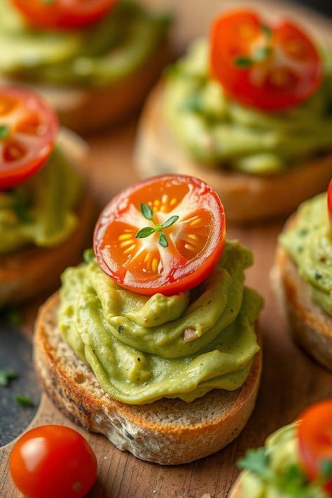 Avocado spread on toast topped with cherry tomato slices. Mini Avocado Toast Appetizer, Mini Avocado Toast Bites, Mini Toast Ideas, Avocado Toast Bites, Avocado Toast Appetizer, Mini Toast Appetizers, Mini Avocado Toast, Veggie Platter Ideas, Snack Low Calorie