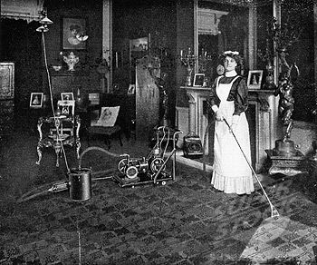 Maid vacuuming carpet, 1911 (using a natural gas powered vacuum cleaner, attached to the gas chandelier ...yikes!) Vintage Aprons, Cabinet Cards, Christmas Past, Victorian Christmas, Large Picture Frames, Futurism, Retro Futurism, Wonderful Images, Picture Library