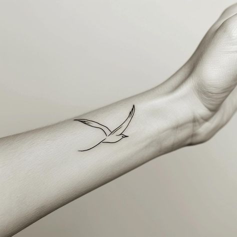 Embrace the freedom symbolized by this minimalist flying bird tattoo, gracefully adorning the wrist. Its delicate lines, accentuated by gentle lighting, invite you to soar in life. Save & follow for more. #MinimalistTattoo #FreedomInk #BirdTattoo #WristArt #SimpleElegance #InkInspiration #AIimage Bird Tattoo On Wrist, Minimalist Bird Tattoo, Gentle Lighting, Sunrise Tattoo, Tattoo On Wrist, Freedom Tattoos, Mama Tattoo, Bird Tattoo Wrist, Flying Bird Tattoo