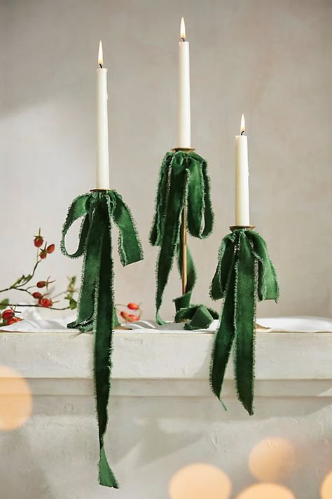 Vintage Art Deco Decor, Anthropologie Christmas Living Room, Plastic Garland Christmas, Anthropologie Christmas Store Display, Velvet Christmas Table Setting, Candles With Bows Christmas, Blush And Green Christmas Decor, Home Decor For Thanksgiving, Earthy Holiday Decor