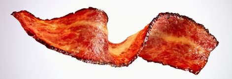 Love bacon? If you're looking to celebrate National Bacon Day in a healthier way, you might think that turkey bacon is the best way to go. But a close look at the nutritional details shows you won’t really be doing your body that much of a favor. Here's how traditional bacon, Canadian bacon, and turkey bacon stack up nutritionally. National Bacon Day, Bacon Day, Chicago Eats, Canadian Bacon, Maple Bacon, Turkey Bacon, Easy Diets, Processed Meat, Global Recipes