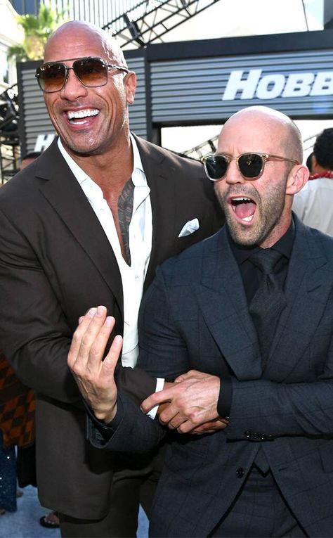 Dwayne Johnson & Jason Statham from The Big Picture: Today's Hot Photos | E! News Christina Hendricks, Dwayne Johnson, Jason Statham, Jason Stratham, Hobbs And Shaw, The Rock Dwayne Johnson, Dwayne The Rock, The Expendables, Clint Eastwood