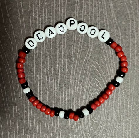 Deadpool bracelet Can be made to custom size, just let me know :) Comes with deadpool/superhero Stickers More bracelets on my page - bundle & save Deadpool Bracelet, Deadpool Gifts, Bracelets Kandi, Superhero Stickers, Kandi Bracelets, Bracelets Design, Bead Charms Diy, Beads Bracelet Design, Ball Bracelet