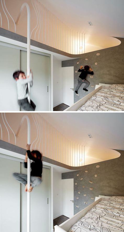 In this kids bedroom, a rock climbing wall lets the children climb up to a lofted area where they can slide down a pole to get down. Rock Climbing Bedroom, Climbing Bedroom, Mezzanine Design, Kids Room Interior, Mezzanine Bedroom, Room Girl, Secret Space, British Home, Rock Climbing Wall