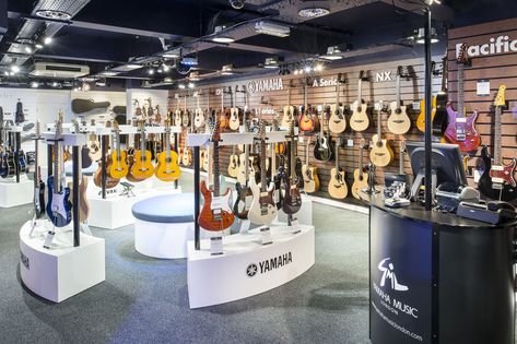 Music Store Interior, Music Store Design, Yamaha F310, Music Exhibition, Yamaha Bass, European School, Yamaha Guitar, Guitar Display, Modern Restaurant Design