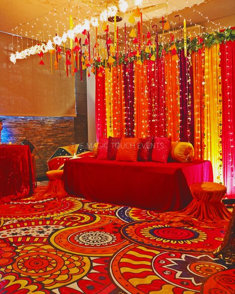 Looking for Mehndi or Dholki decor inspirations? Here’s a perfect one for your events this fall. #dholki #sangeet #mehendi #mehndi Dholki Stage Decor, Mehendi Set Up At Home, Best Sangeet Decorations, Gulabi Night Decoration Ideas, Mehndi At Home Decor, Mehndi Set Up Decor, Mehndi And Sangeet Decor, Mehandi Decorations Ideas, Sangeet Decoration Ideas At Home