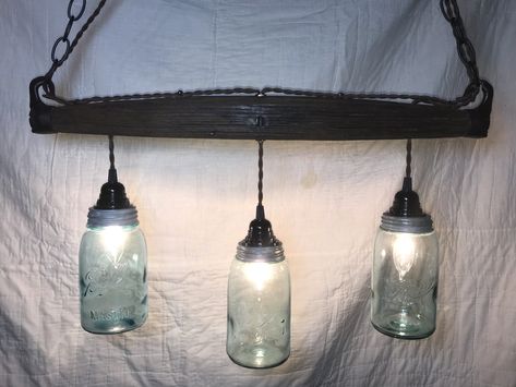 Excited to share the latest addition to my ThisThatlumination shop: Horse Yoke Mason Jar Chandelier https://etsy.me/2jXy0gK #housewares #lighting #brown #wood #countryfarmhouse #patiooutdoor #blue #fathersday #housewarming Reclaimed Wood Chandelier, Mason Jar Light Fixture, Insulator Lights, Wood Ceiling Lights, Jar Chandelier, Mason Jar Chandelier, Brass Vanity Light, Edison Light, Blue Mason Jars