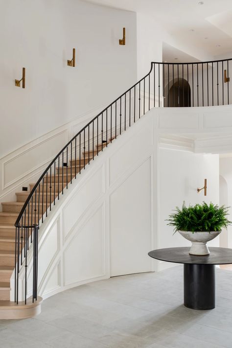 Bridal Staircase, Brooke Wagner Design, Brooke Wagner, Wrought Iron Handrail, White Wainscoting, Iron Staircase, Treads And Risers, Newport Coast, Brass Sconces