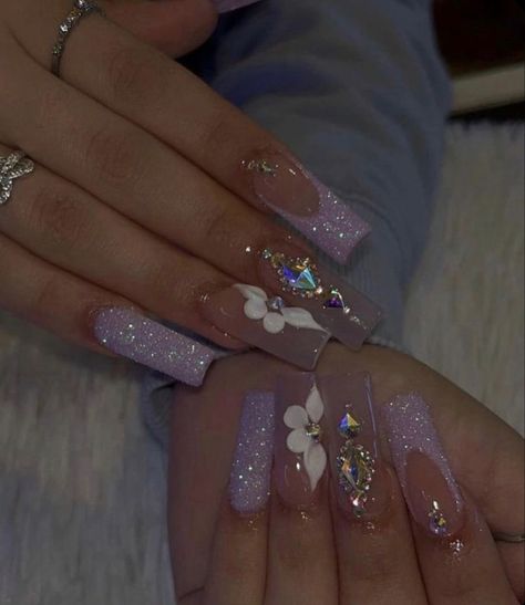 Lilac Baddie Nails, Latina Nail Designs Purple, Soft Makeup Look With Rhinestones, Lavender Baddie Nails, Silver And Purple Acrylic Nails, Purple Prom Nails Coffin, Short Acrylics With Rhinestones, Popular Acrylic Nails 2023, Quince Nails Purple Butterfly