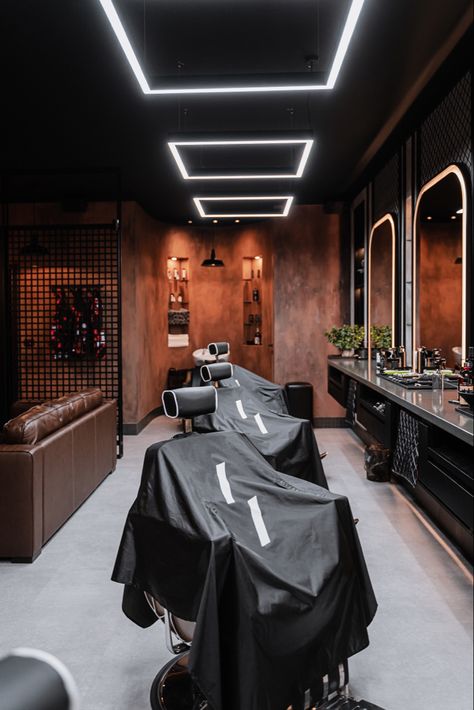 Dark Barber Shop Interior, Men's Barber Shop Decor, Barber Shop Lighting Ideas, At Home Barbershop, Barber Shop Color Palette, Barber Studio Ideas Luxury, Old School Barbershop, Classic Barbershop Design, Barbershop Lighting Ideas