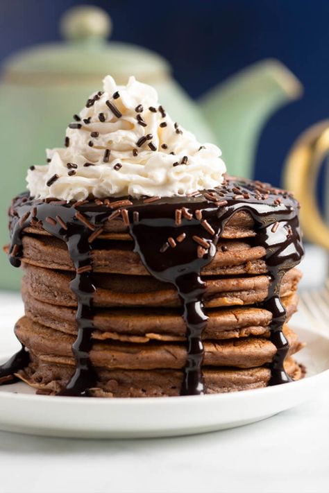 For a cozy morning or indulgent brunch, our hot chocolate pancakes are sure to delight. Made with Swiss Miss® Non-Dairy Hot Cocoa Mix and topped with chocolate syrup and Reddi-wip®, our hot chocolate pancake recipe makes any breakfast a treat! Hot Chocolate Pancakes, Ready Set Eat, Swiss Miss, Chocolate Pancakes, Coconut Custard, Pastry Crust, Hot Cocoa Mixes, Chocolate Caliente, Melting Chocolate Chips