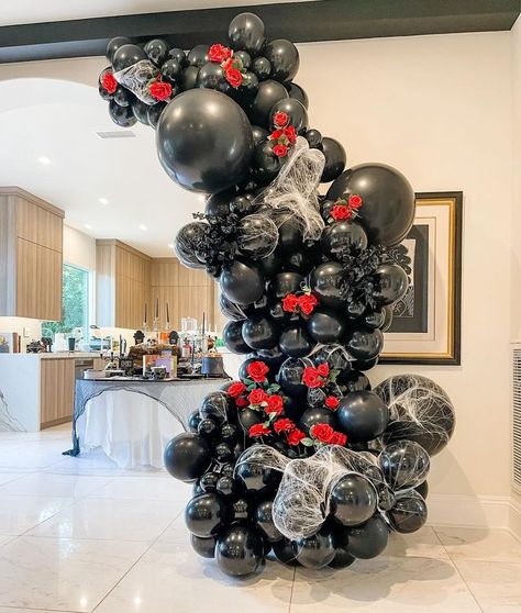 Black Onyx 🌹 || We had such a great time creating this Halloween installation this past weekend. The roses are my favorite. #partyshopavenue #party #events #eventinspo #partyballoons #birthdayparty #laevents #partyideas #luxuryballoons #birthday #balloongarland #qualatex #tuftex #ballooninstallation #beautifulballoons #balloons #beautifuldecor #eventdesigner #garlands #halloween Scary Halloween Balloon Arch, Horror Balloon Garland, Gothic Balloon Garland, Gothic Balloon Arch, Red Black Balloon Garland, Halloween Installation, Haunted Homecoming, Gothic Birthday Party, Emo Party