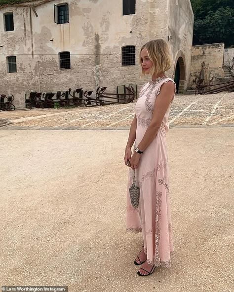 Pretty in pink! Lara Bingle stunned in a silk dress while on bridesmaid duties at her frie... Dress In Italy, Lara Bingle, Lara Worthington, Androgynous Haircut, Sam Worthington, Third Child, Bridesmaid Duties, Gamine Style, Dress Out