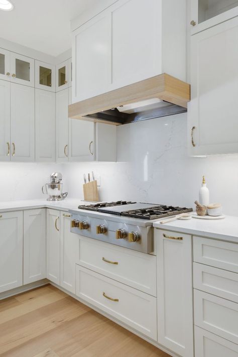 The Mystic White Quartz countertops continue up the wall for a clean look with a solid surface backsplash. Kitchen Surfaces Countertops, Kitchen Quartz Backsplash, Solid Surface Backsplash, White Quartz Countertop Kitchen, Quartz Backsplash Kitchen, Kitchen Backsplash Inspiration, California Chic, White Kitchen Countertops, Kitchen Hood Design