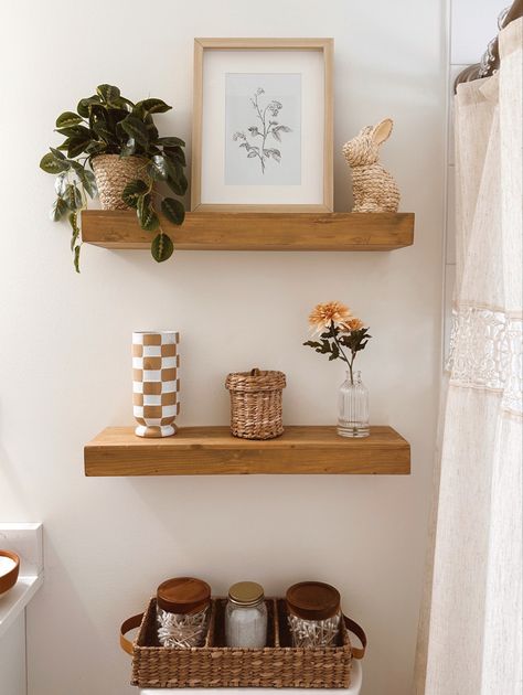 Shelf Next To Toilet, Bathroom Counter Decor Boho, Modern Boho Guest Bathroom, Wicker Bathroom Shelf, Neutral Boho Home Decor, Floating Shelves Apartment, Bathroom Decor Floating Shelves, Desert Boho Bathroom, Rustic Boho Bathroom Decor