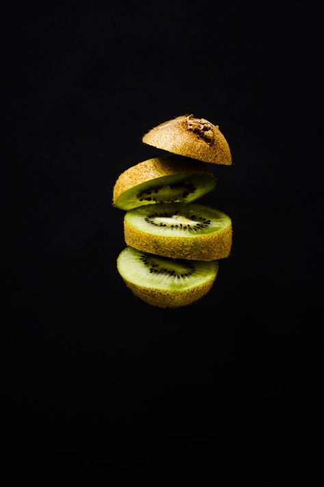 Download this photo by Denis Blzz on Unsplash Kiwi Health Benefits, Black Background Photo, Kiwi Benefits, Fruit Photography, Fruit Slice, Green Fruit, Kiwi Fruit, Free Plants, Background Photo