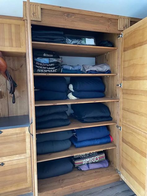 Barn Blanket Storage, Horse Gear Storage, Tack Room Shelves, Tack Room Cubbies, Horse Rugs Storage, Horse Blanket Organization, Luxury Equine Facility, Horse Blanket Storage Ideas, Horse Rug Storage Ideas