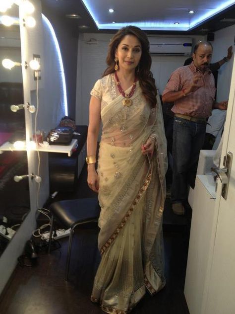 Another hit saree worn by Madhuri. For a Gujju wedding, this can also be used as a panetar. just thinking Gujju Wedding, 40 And Fabulous, Madhuri Dixit, Wedding Cake Designs, Bollywood Celebrities, Indian Sarees, How To Look Classy, Kids Wear, Cake Designs