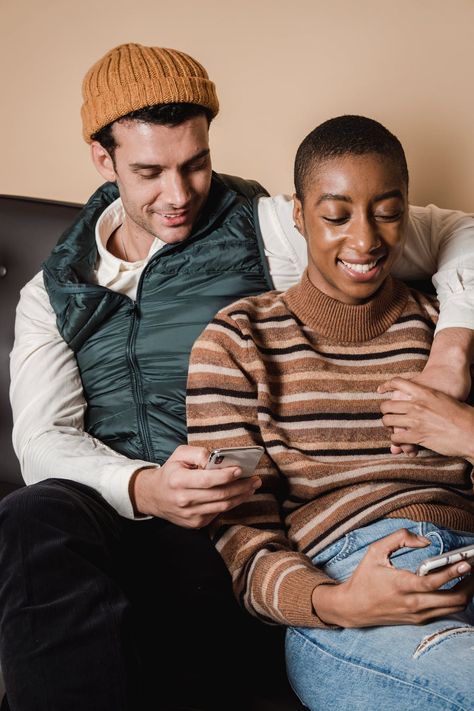 Smiling diverse couple browsing smartphones together · Free Stock Photo Diverse Couples, Wallpapers Couple, Black Short Hair, Cutoff Jeans, High Waisted Trouser Pants, Iphone Wallpaper Ios, Simple Phone Wallpapers, Black And White Gingham, Weave Fabric