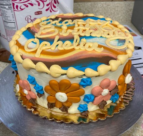 70’s themed birthday cake w/ swirl pattern and daisies on sides, tan, burnt orange, pink, blue 70s Swirl Pattern, Pattern Cake, Patterned Cake, Themed Birthday Cakes, Swirl Pattern, Aesthetically Pleasing, Cake Ideas, Orange Pink, Burnt Orange