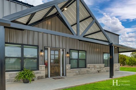 Barndominium Metal Colors, Barndominium With Brick Skirt, Homes With Metal Siding, Steel Building Color Combinations, Barndominium With Brick Exterior, Taupe Barndominium Exterior, Barndo Exterior Ideas, Beige Barndominium Exterior, Shop House Exterior Design