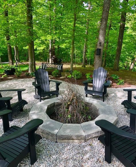 Fire Pit Pea Gravel Patio Design, Boulders In Flower Beds, Hot Water Outside, Black Gravel Fire Pit Area, Backyard Wedding Landscape Ideas, Fire Pit Ideas Wooded Backyard, Acreage Fire Pit Area, Farmhouse Fire Pit Ideas Backyard, Deck To Fire Pit Transition