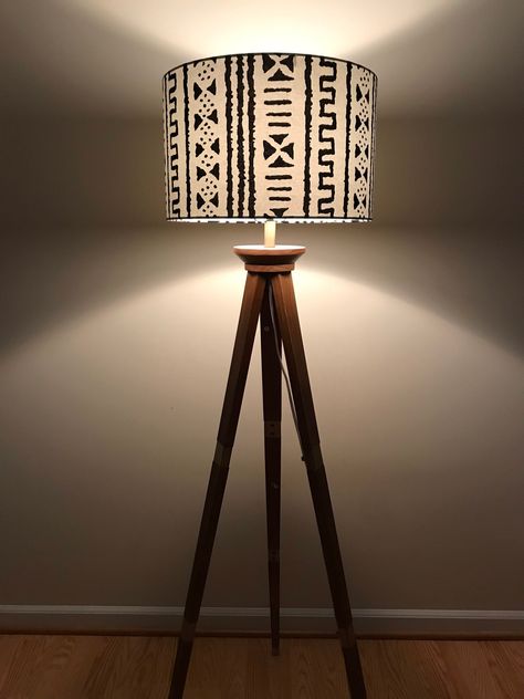 THIS LISTING DOES NOT INCLUDE THE LAMP BASE OR THE GIRAFFES. LAMP BASE AND GIRAFFES ARE NOT FOR SALE. -Handmade lampshade featuring a mudcloth print fabric -Outer fabric is African print, 100% cotton -PVC lining -Choose from UNO or Spider/Harp internal fitting -Recommended to use with 60 Watt bulb -Made to order, so it takes about 3-5 days to ship out -15.7 inches diameter (40 cm), Height is 9.75 inches I take special orders for lampshades, so if you see a print in my store that you would like o African Decor Living Room, African Bedroom, Modern African Decor, Print Lampshade, Interior Design Indian, Ethnic Furniture, Afrocentric Decor, African Interior Design, Floral Lampshade