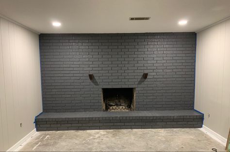 Painted fireplace peppercorn Peppercorn Fireplace, Grey Painted Brick, Black Brick Fireplace, Charcoal Grey Paint, Painted Fireplace, Painted Brick Fireplace, Basement Fireplace, Fireplace Room, Charcoal Paint