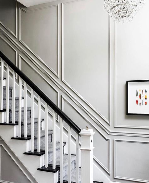 Applied molding is a simple way to add high impact dimension. ⠀ ⠀ ⠀ Interiors by @lcinteriors ⠀⠀ ⠀ ⠀ #entryway #entrywayideas #foyer… | Instagram Stairway Wainscoting, Staircase Molding, Staircase Paneling, Applied Molding, Stairway Gallery Wall, Wainscoting Staircase, Accent Wall Entryway, Stair Paneling, Wainscoting Stairs