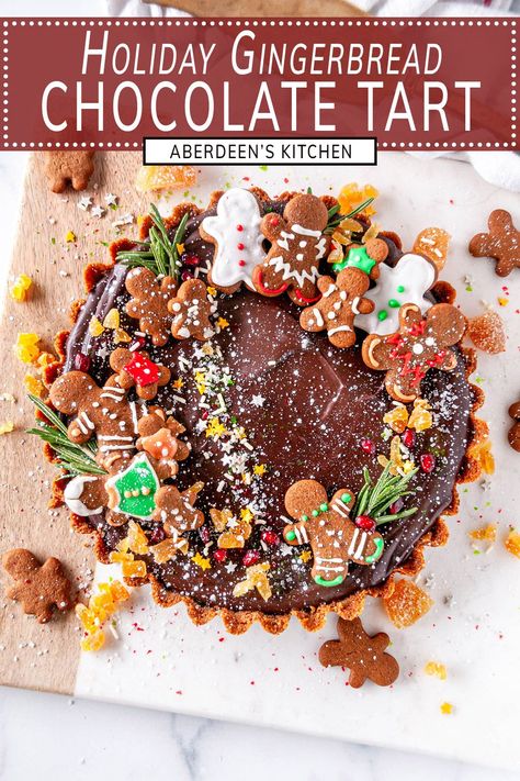 Looking for a dessert that says "wow" at your holiday party? Say hello to the gingerbread chocolate tart! This sweet treat is a match made in heaven, with a spicy gingersnap crust and a decadent, silky chocolate ganache filling. And the best part? It's a cinch to whip up! From aberdeenskitchen.com #gingerbread #chocolate #tart #festive #holiday #dessert #recipe #pie #christmas #baking Holiday Tarts, Gingerbread Chocolate, Pie Christmas, Chicory Recipe, Ganache Filling, Chocolate Ganache Filling, Gingersnap Crust, Festive Desserts, Coffee Cookies