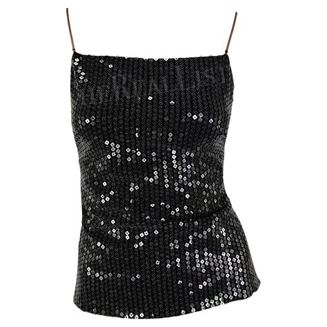 Presenting a fabulous black rhinestone Gianni Versace tank top, designed by Donatella Versace. From 1999, this top is covered in transparent sequins that perfectly catch the light with every movement. The top features a square neckline, and metal rose gold-tone straps, and is made complete with a strap that wraps around the back and is accented with a Versace Medusa relief hook. Never worn before, this top comes with the original brand tags still attached from over 20 years ago! Approximate meas Versace Clothes Women, Versace Outfit Women, Sequin Black Top, Versace Clothes, Versace Tops, Versace Top, Fancy Fits, Sequins Top, Black Sequin Top