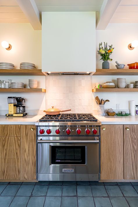 This kitchen is the perfect blend of modern and rustic design. The sleek wood stained cabinets and shelves are a perfect contrast to the white tile backsplash and marble counter. The kitchen is open and bright, with plenty of space to cook and entertain. The beautiful wood shelves add a touch of rustic charm, while the marble countertop adds a touch of luxury. This kitchen is sure to be the heart of your home. Wood Stained Cabinets, Modern Rustic Kitchen, Stained Cabinets, Cedar Cove, Cabinets And Shelves, White Tile Backsplash, Staining Cabinets, Rustic Modern Kitchen, Marble Counter