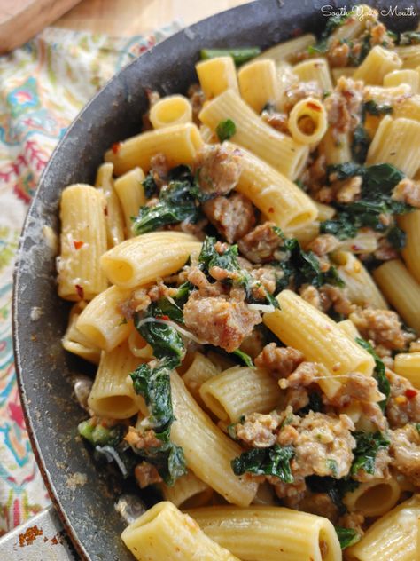 Spicy Sausage & Kale Rigatoni | A rustic, 30-minute pasta recipe of Italian sausage and kale with a simple but unbelievably delicious sauce made with pasta water, butter and parmesan cheese. Italian Sausage And Kale One Pot Pasta, Kale Italian Sausage, Chicken Sausage With Kale Recipes, Sausage Arugula Pasta, Italian Sausage And Kale Recipes, Italian Sausage Kale Pasta, Sausage Kale Pasta Recipes, Sausage Kale Recipes, Kale Sausage Pasta