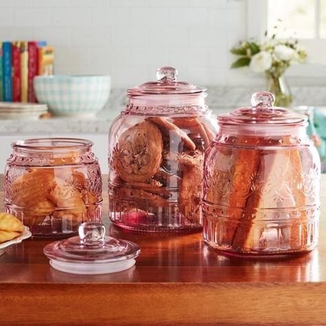 A set of three glass storage canisters from the Pioneer Woman collection so you can store all the amazing treats you'll be baking with the above bakeware set! Is there anything in the world that brings more joy than a cookie jar full of perfectly chewy cookies?! Get this set and you're basically buying edible joy. Country Tablescapes, Pioneer Woman Canisters, Champagne Christmas, Glass Kitchen Canisters, Pioneer Woman Ree Drummond, Pioneer Woman Kitchen, Purple Kitchen, Kitchen Wall Hangings, Kitchen Canister Set