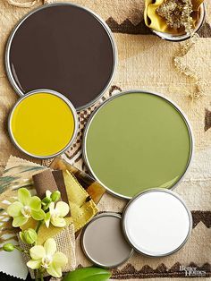 Exotic locales produce distinctive color schemes, including this palette that features coffee-bean brown. Putty gray and creamy white supply cooler counterpoints to the warm brown, while yellow, citron, and leafy green evoke images of sunbeams, tropical blooms, and verdant growth./ Best Interior Paint, Bitter Chocolate, Kitchen Decor Themes, Nature Color Palette, Decorating Themes, Interior Paint Colors, Diy Interior, Paint Schemes, Warm Brown