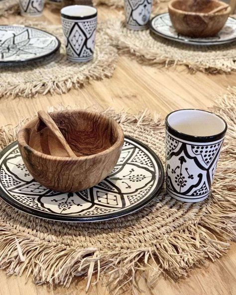 When it comes to setting the table, it's all about the details ✨🍽 A rustic wooden table adorned with our stunning handmade raffia table map, complemented by an eclectic mix of plates that seamlessly blend different styles makes a beautiful table that marries natural ethnic charm with contemporary flair. Discover our collection at zocohome.com! 📲 #furnituredesign #bohodecor #outdoordecor #ethnicdecor #setthetable #tabledecor Moroccan Table Setting, Ramadan Table Setting, Scandinavian Style Furniture, Moroccan Table, Rustic Wooden Table, Ethnic Decor, Best Small Business Ideas, Porcelain Tableware, Organic Style