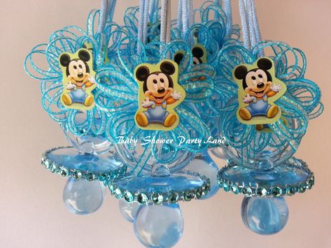 "Lot of 12 Baby Mickey Mouse Pacifier Necklaces Baby Shower Party Games These Pacifiers are perfect for classic \"Don't say BABY!\" or \"Don't cross your Legs!\" baby shower game. Pick a baby shower action or word such as \"mom\" or \"baby\" As yours guests arrive, give each of them a pacifier necklace and tell them not to say the word. If a guest catches someone saying the word or crossing their legs while sitting during the shower that person gives their pacifier to the person who caught them, Mickey Baby Showers, Pacifier Necklace, Baby Blocks Baby Shower, Crown Baby Shower, Baby Boy Decorations, Baby Shower Party Games, Minnie Mouse Baby Shower, Chico California, Baby Mickey Mouse