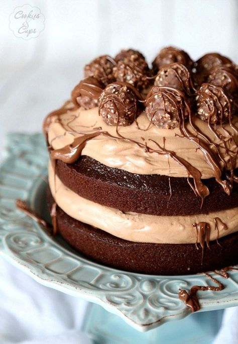 This easy Chocolate Hazelnut Layer Cake is a showstopper! It's a simple one-bowl chocolate cake filled with a chocolate hazelnut spread and a cheesecake mousse. Everyone will love this layer cake recipe! #chocolate #hazelnut #layercake #chocolatehazelnut #layercakerecipe #chocolatecakerecipe #bestchocolatecake #nutellacake Chocolate Hazelnut Cake, Nutella Cake, Hazelnut Cake, Chocolate Hazelnut Spread, Best Chocolate Cake, Chocolate Cakes, Baked Goodies, Think Food, Ferrero Rocher