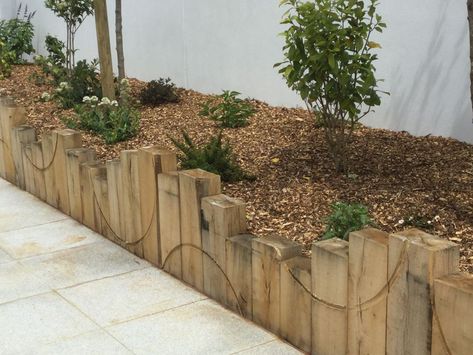 Routed railway sleeper retaining wall Railway Sleepers Garden, Sleeper Retaining Wall, Sleepers In Garden, Garden Dividers, Garden Retaining Wall, Railway Sleepers, Landscaping Retaining Walls, Front Garden Design, Back Garden Design