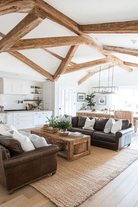 Enhance your home’s character with exposed wooden ceiling beams. Whether you’re going for a farmhouse look or a modern rustic vibe, wooden beams add depth and style. 🏠✨🌲 #WoodenBeams #CeilingDesign #HomeDecor #RusticCharm Post And Beam Homes Interior, Lighting On Beams, Wooden Ceiling Beams, Beam House, Beams Living Room, Wooden Beams Ceiling, Exposed Ceilings, Post And Beam Home, Wooden Ceiling