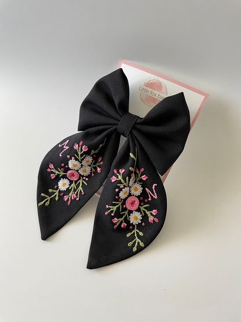 Floral Hair Bow, baby headbands are hand embroidered with love.  The length of our buckle is 20 cm.Please select the buckle number and specify it in the message. If not specified, 8 cm automatic clip buckle will be used.  The color in the picture is black. I can embroider names or letters within your specification. Ideal gifts for her; mother, sister, girlfriend, grandchild.Perfect for daily use. Can be a lovely birthday gift or a holiday gift. Perfect for children and adults. It is carefully wrapped and sent. Thank you for visiting my shop. Please do not hesitate to contact me with your questions. I will be happy if you follow me on instagram : https://instagram.com/littlefoxbant?igshid=YmMyMTA2M2Y= **Price for one hairbow ** Embroidery Hair Accessories, Embroidered Hair Bow, Embroider Names, Bows Ideas, Black Hair Bow, Embroidered Bows, Bow Hair Tie, Children Accessories, Embroidered Hair Bows